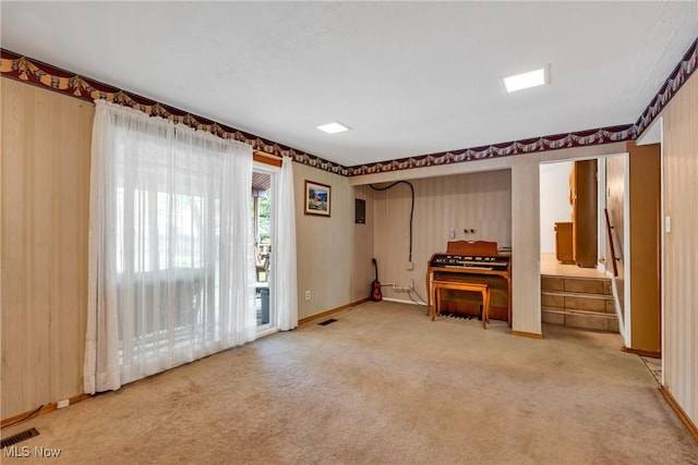 6221 Brighton Dr, North Olmsted, OH 44070 - living area featuring light colored carpet and baseboards