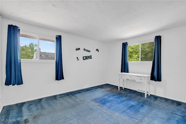6221 Brighton Dr, North Olmsted, OH 44070 - carpeted empty room with baseboards