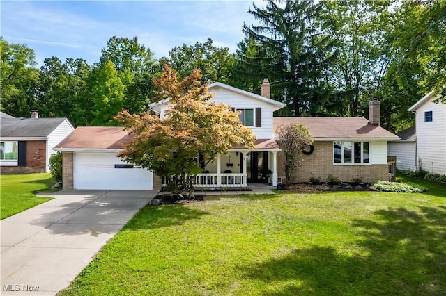 6221 Brighton Dr, North Olmsted, OH 44070 - view of front of home featuring brick siding, driveway, a chimney, a front yard, and covered porch