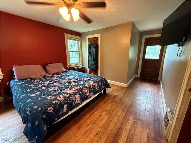 7350 Center Rd, Saybrook, OH 44004 - bedroom featuring light wood finished floors, baseboards, and ceiling fan