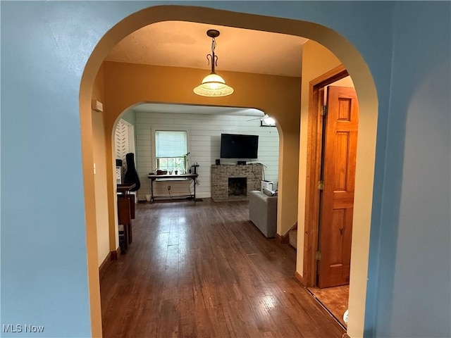 7350 Center Rd, Saybrook, OH 44004 - corridor featuring dark wood finished floors and baseboards