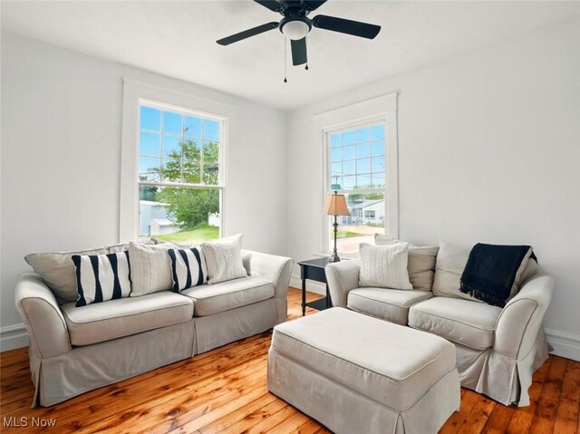 1433 W 4th St, Ashtabula, OH 44004 - living room with plenty of natural light, light wood-type flooring, a ceiling fan, and baseboards