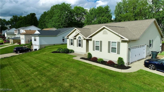 615 Wolf Ave, Wadsworth, OH 44281 - ranch-style home featuring a front yard, a garage, and roof with shingles