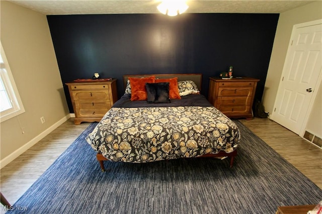 615 Wolf Ave, Wadsworth, OH 44281 - bedroom with wood finished floors and baseboards