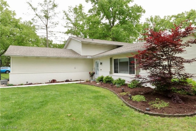 5430 Barkwood Dr, Sheffield Village, OH 44054 - tri-level home featuring a front yard and roof with shingles