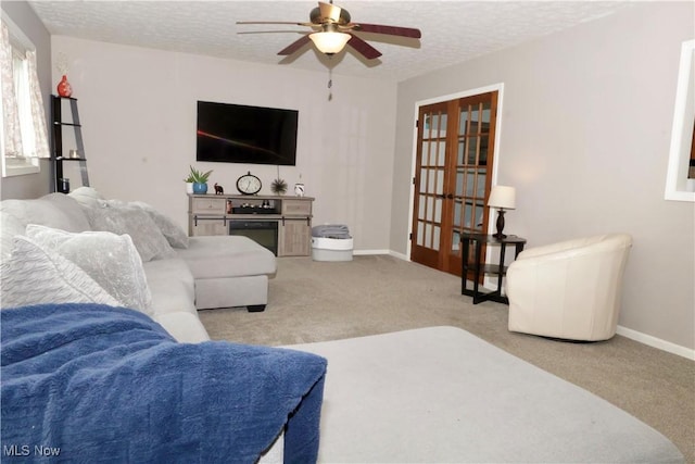 5430 Barkwood Dr, Sheffield Village, OH 44054 - living area featuring carpet floors, a ceiling fan, a textured ceiling, and baseboards