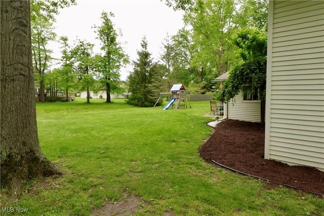 5430 Barkwood Dr, Sheffield Village, OH 44054 - view of green lawn with a playground