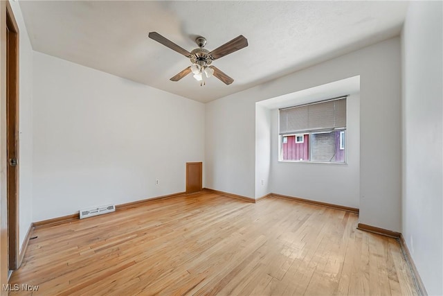 27701 Mills Ave Unit 2N, Euclid, OH 44132 - unfurnished room with ceiling fan, light wood-style floors, and baseboards
