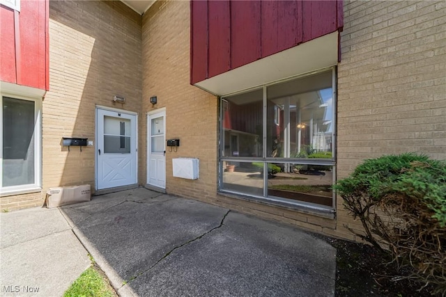 27701 Mills Ave Unit 2N, Euclid, OH 44132 - doorway to property with brick siding