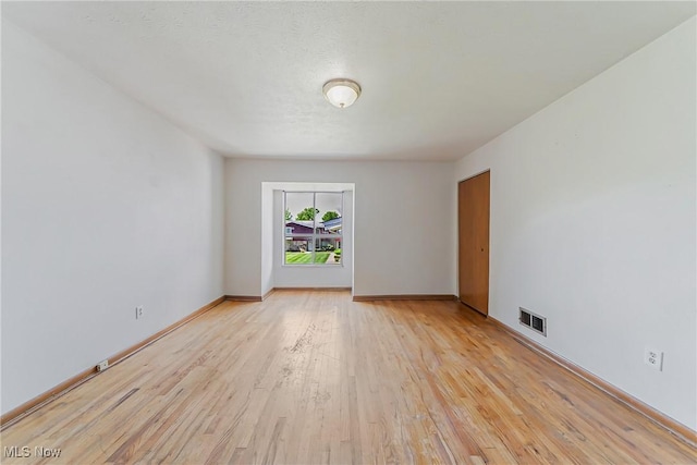 27701 Mills Ave Unit 2N, Euclid, OH 44132 - empty room with light wood-style floors and baseboards