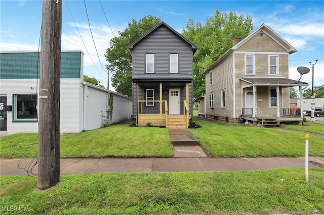 1664 Linden Ave, South Zanesville, OH 43701 - view of front facade with covered porch and a front lawn