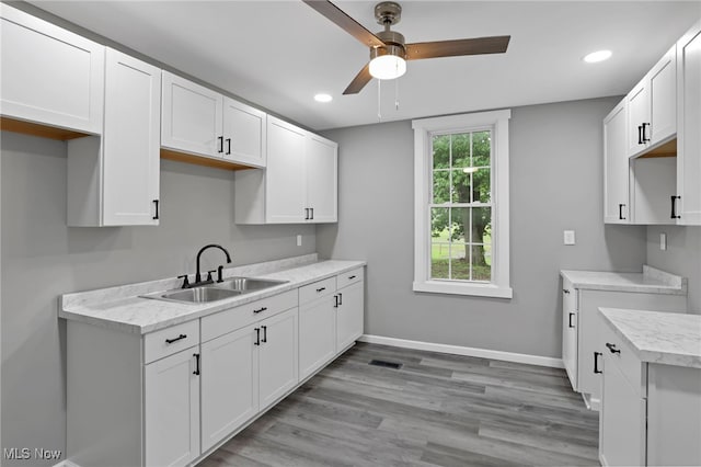 1664 Linden Ave, South Zanesville, OH 43701 - kitchen featuring a sink, ceiling fan, recessed lighting, light countertops, and baseboards