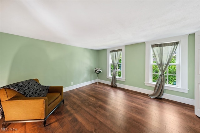 6813 W Clinton Ave, Cleveland, OH 44102 - living area featuring wood finished floors and baseboards