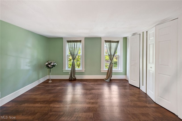 6813 W Clinton Ave, Cleveland, OH 44102 - unfurnished room with wood finished floors and baseboards