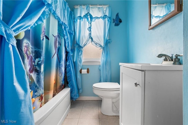 380 E 328th St, Willowick, OH 44095 - full bathroom featuring vanity, toilet, tile patterned floors, and shower / tub combo with curtain