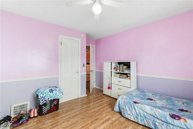 380 E 328th St, Willowick, OH 44095 - bedroom featuring wood finished floors, a ceiling fan, and baseboards