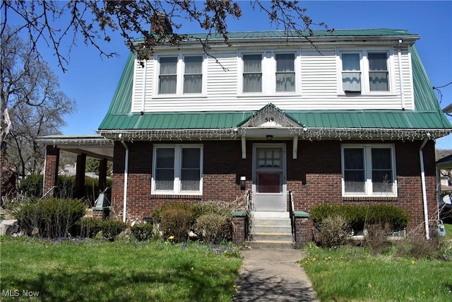 519 E Lincoln Way, Lisbon, OH 44432 - view of front of home with brick siding, a chimney, and entry steps
