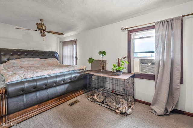 4521 W 147th St, Cleveland, OH 44135 - carpeted bedroom with cooling unit, baseboards, and a ceiling fan
