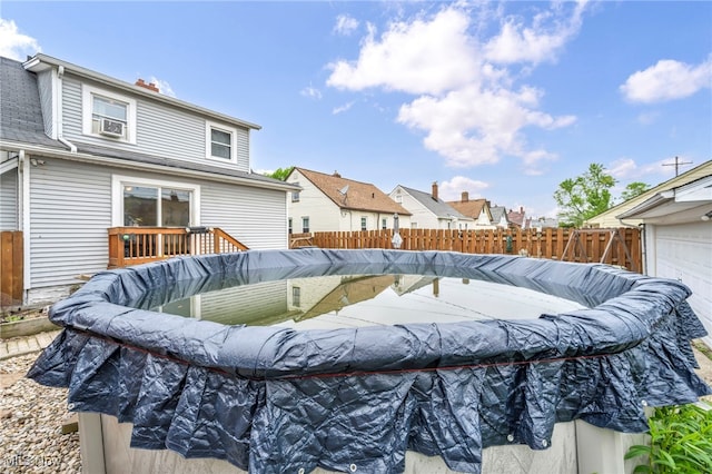 4521 W 147th St, Cleveland, OH 44135 - view of swimming pool featuring a fenced backyard and a residential view