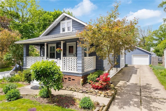 794 Ranney St, Akron, OH 44310 - bungalow-style home featuring a porch, a garage, concrete driveway, and an outdoor structure
