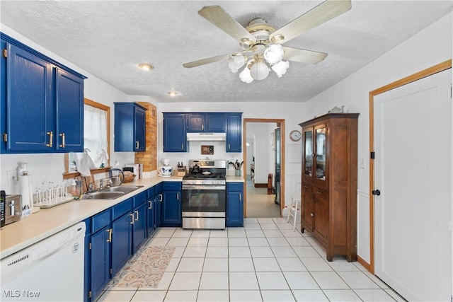 794 Ranney St, Akron, OH 44310 - kitchen featuring gas range, dishwasher, a sink, under cabinet range hood, and blue cabinetry