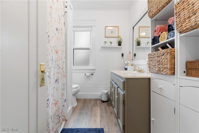 794 Ranney St, Akron, OH 44310 - full bath with vanity, toilet, wood finished floors, and curtained shower