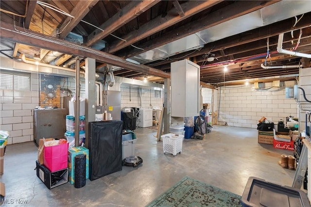 794 Ranney St, Akron, OH 44310 - basement featuring concrete block wall and washing machine and dryer