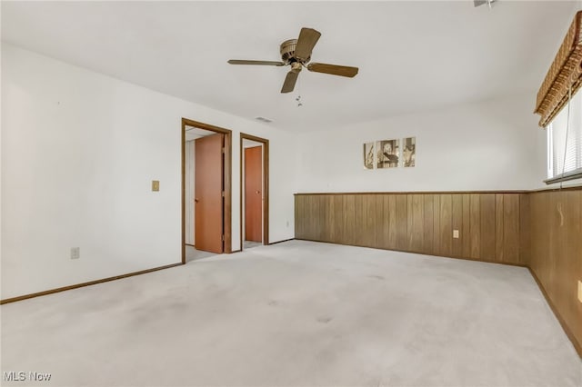 36948 S Lake Shore Blvd, Eastlake, OH 44095 - empty room featuring a ceiling fan and light colored carpet
