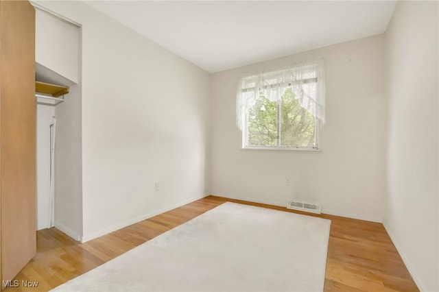 36948 S Lake Shore Blvd, Eastlake, OH 44095 - unfurnished room featuring light wood finished floors and baseboards