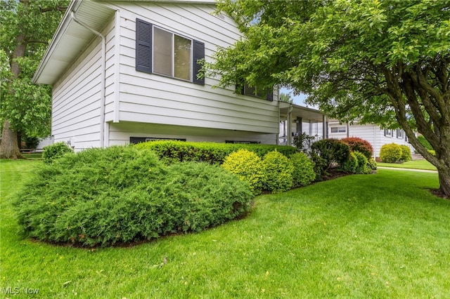 36948 S Lake Shore Blvd, Eastlake, OH 44095 - view of property exterior featuring a yard