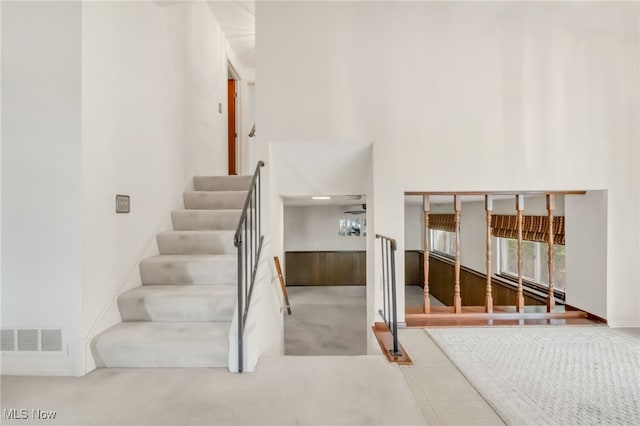 36948 S Lake Shore Blvd, Eastlake, OH 44095 - staircase with carpet floors