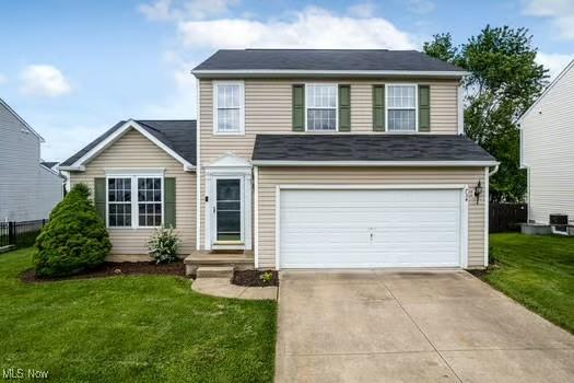 734 Sparrow Way, Wadsworth, OH 44281 - traditional-style home with an attached garage and driveway