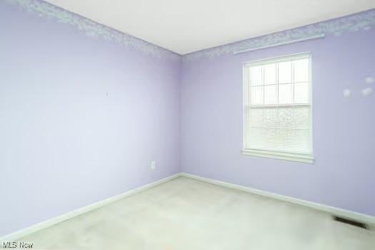734 Sparrow Way, Wadsworth, OH 44281 - carpeted spare room featuring baseboards