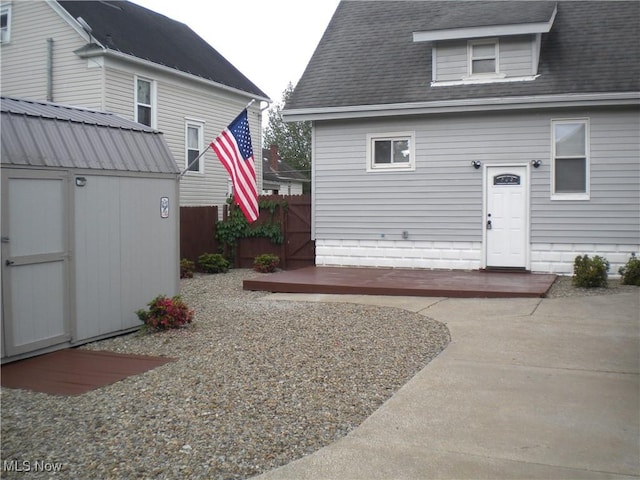 161 25th St NW, Barberton, OH 44203 - back of property with roof with shingles