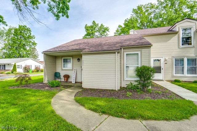 2377 Ansley St, Alliance, OH 44601 - view of front of property featuring a front yard and roof with shingles