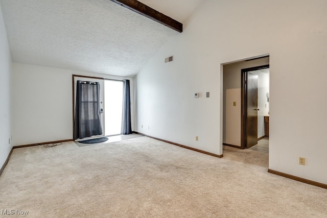 2377 Ansley St, Alliance, OH 44601 - spare room featuring light carpet, baseboards, and a textured ceiling