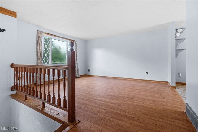 3067 Bronco Dr, Clinton, OH 44216 - empty room featuring wood finished floors and baseboards
