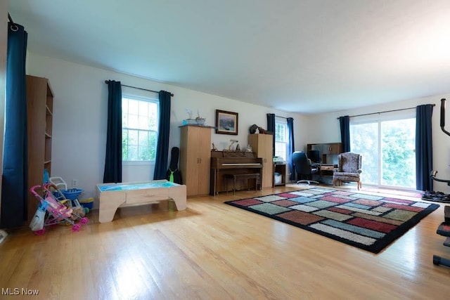 5940 Hansom Dr, Solon, OH 44139 - living area featuring plenty of natural light and wood finished floors