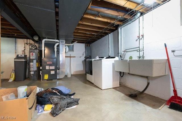 5940 Hansom Dr, Solon, OH 44139 - unfinished below grade area with separate washer and dryer, a water softener system, heating unit, water heater, and a sink