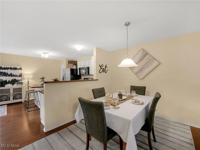 6010 Turnwood Dr, Westerville, OH 43081 - dining space with wood finished floors and baseboards