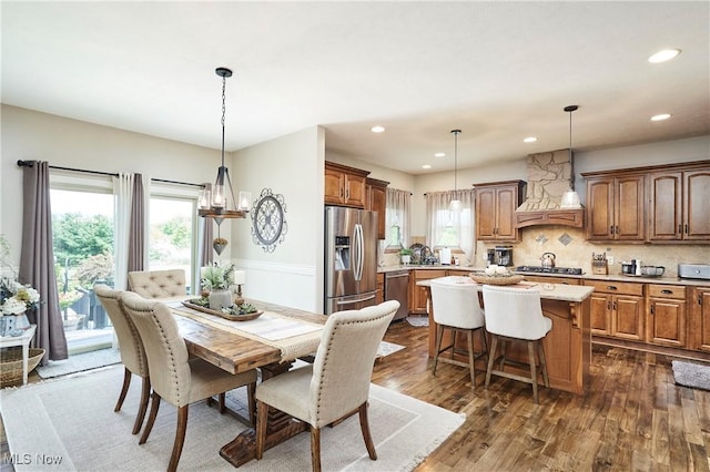 7355 Hunters Glen Ln, Seville, OH 44273 - dining area featuring dark wood-style floors, recessed lighting, and a chandelier