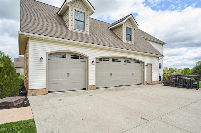 7355 Hunters Glen Ln, Seville, OH 44273 - garage with concrete driveway