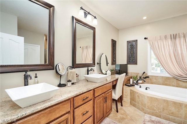 7355 Hunters Glen Ln, Seville, OH 44273 - bathroom with double vanity, a garden tub, and tile patterned floors