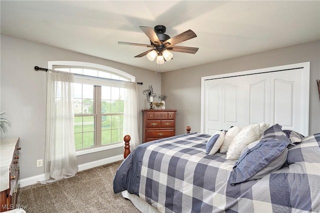 7355 Hunters Glen Ln, Seville, OH 44273 - carpeted bedroom featuring a closet, baseboards, and ceiling fan