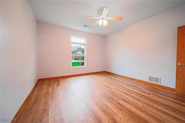 217 Greenbriar Ln, Dalton, OH 44618 - empty room featuring wood finished floors, baseboards, and a ceiling fan