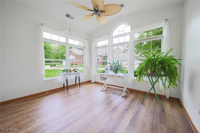 217 Greenbriar Ln, Dalton, OH 44618 - sunroom with wood finished floors, baseboards, and lofted ceiling