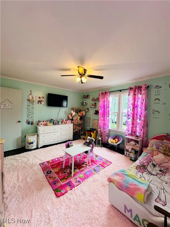 418 Main St, Philo, OH 43771 - living area featuring carpet flooring and ceiling fan