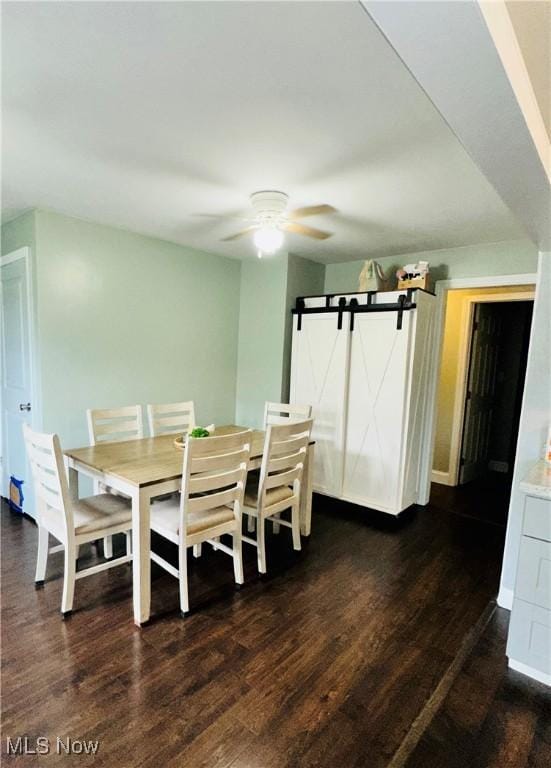 418 Main St, Philo, OH 43771 - dining space featuring dark wood finished floors and ceiling fan