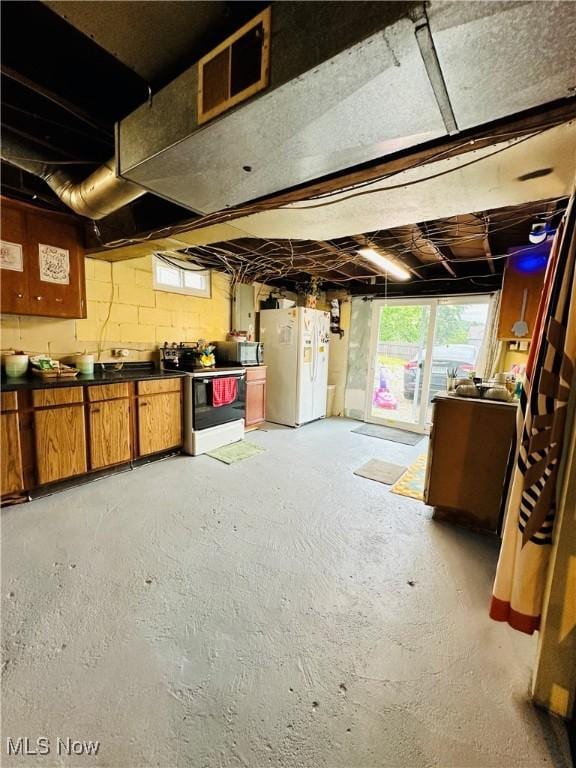 418 Main St, Philo, OH 43771 - basement featuring white fridge with ice dispenser
