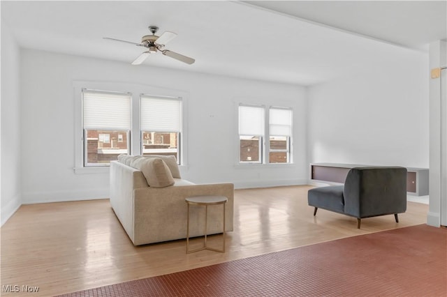 2472 Overlook Rd Unit 11, Cleveland Heights, OH 44106 - living area featuring wood finished floors, a ceiling fan, and baseboards